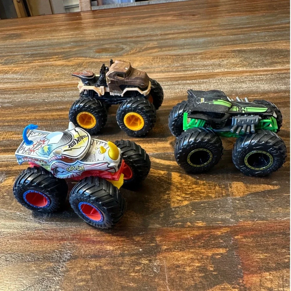 Monster Jam Truck HotWheel Lot of 3 1:64 Rhinomite Jurassic World Radical Racer